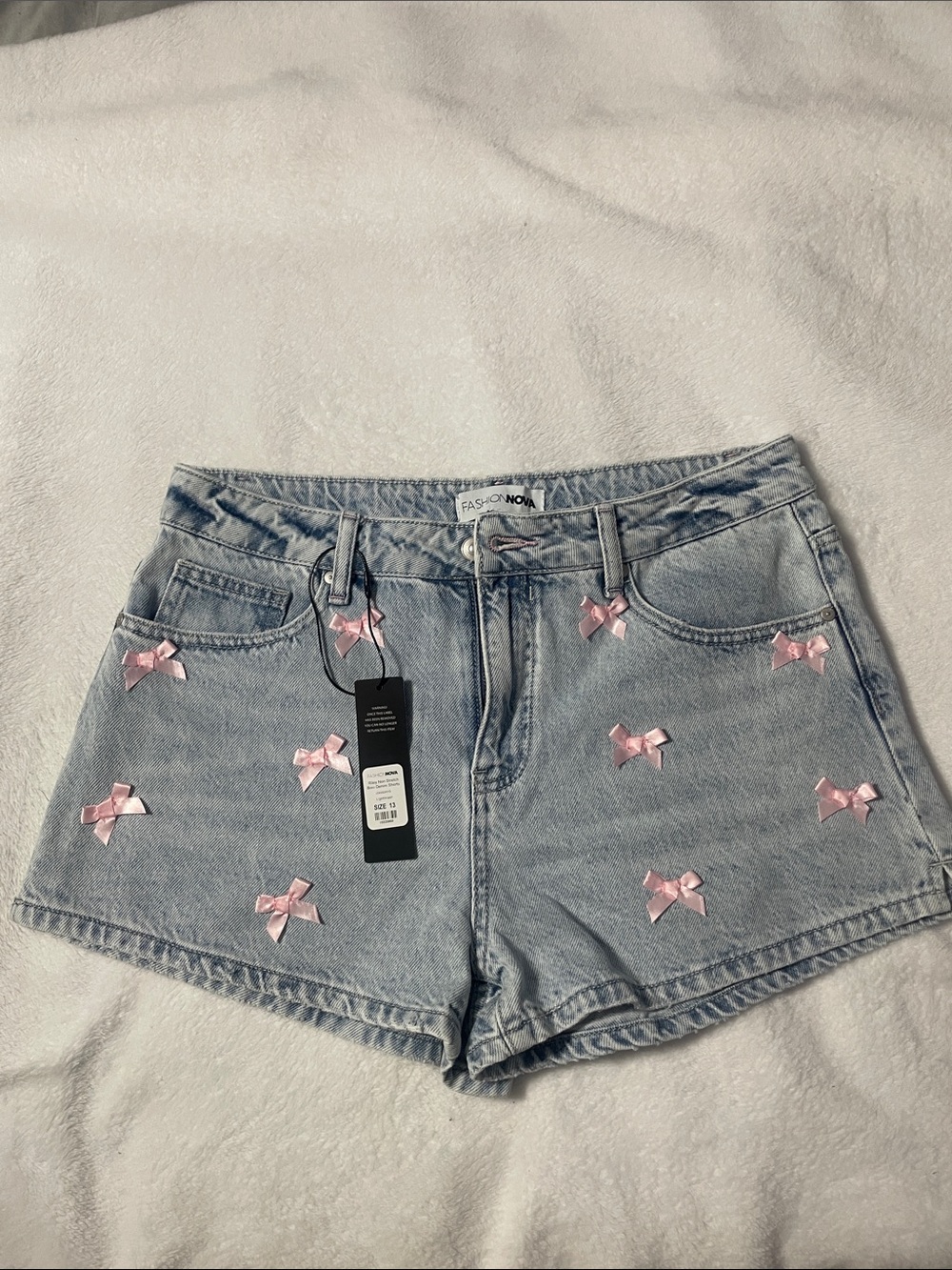 Fashion Nova Light Blue Denim Shorts with Pink Bow Embellishments